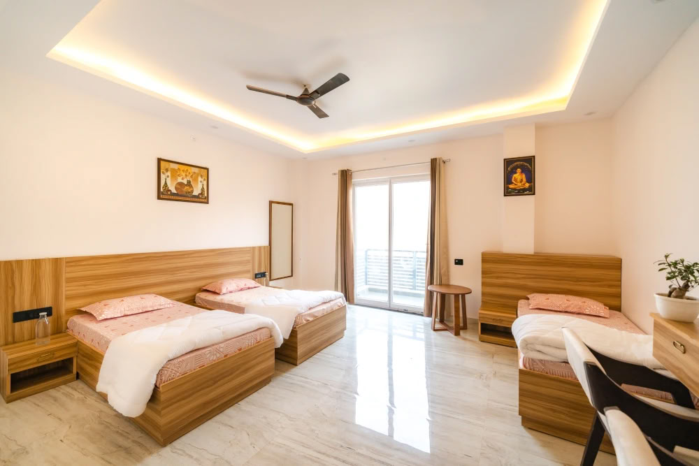 Triple chambre partagée (hébergement premium)